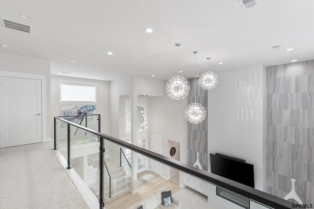 12604 N 178th Cir, Bennington, NE 68007 - hallway featuring an upstairs landing, recessed lighting, and a chandelier