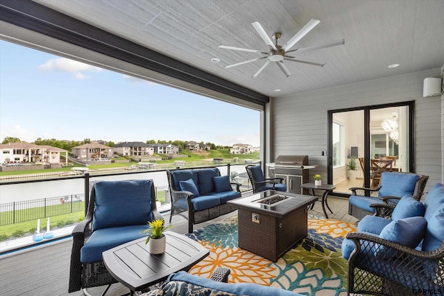 12604 N 178th Cir, Bennington, NE 68007 - wooden terrace featuring an outdoor living space with a fire pit, ceiling fan, a water view, a residential view, and grilling area