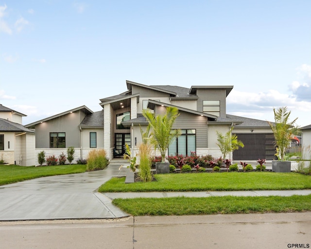 12604 N 178th Cir, Bennington, NE 68007 - modern home featuring a front yard, a shingled roof, and stucco siding