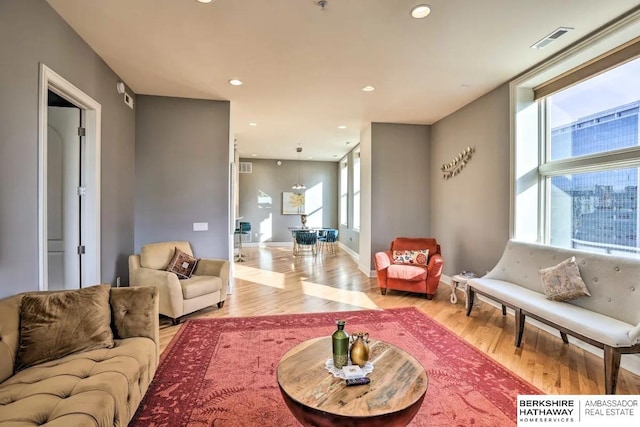 210 S 16th St S Unit 918, Omaha, NE 68102 - living room with light wood-style floors and recessed lighting
