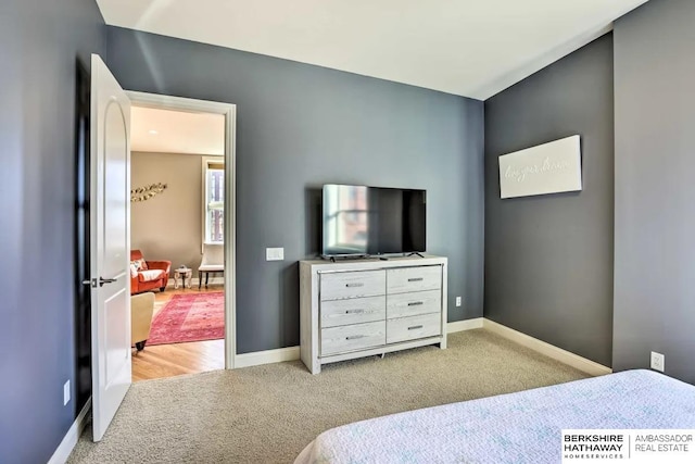 210 S 16th St S Unit 918, Omaha, NE 68102 - bedroom featuring carpet floors and baseboards