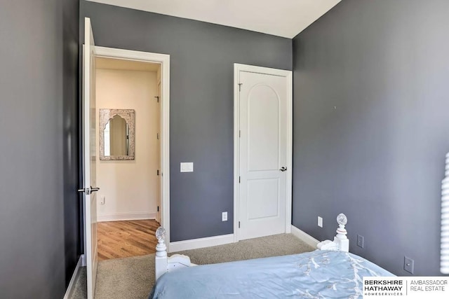 210 S 16th St S Unit 918, Omaha, NE 68102 - carpeted bedroom featuring baseboards