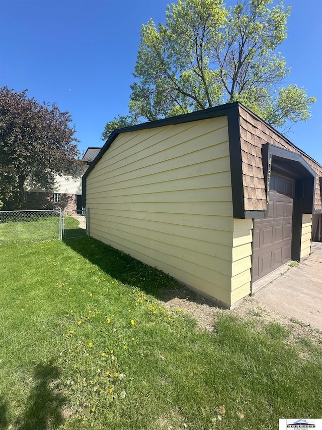 4319 Abbott Rd, Lincoln, NE 68516 - view of side of home featuring a garage and an outdoor structure
