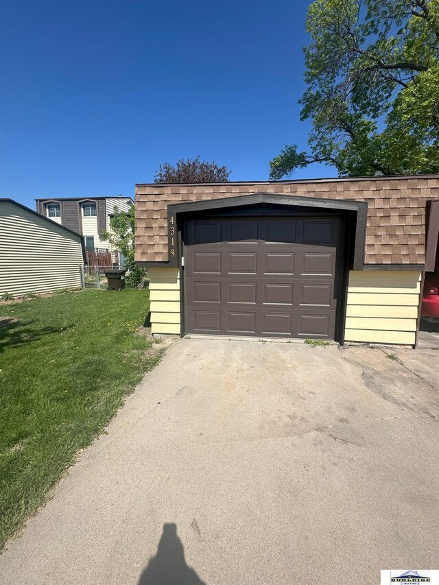 4319 Abbott Rd, Lincoln, NE 68516 - garage featuring asphalt driveway