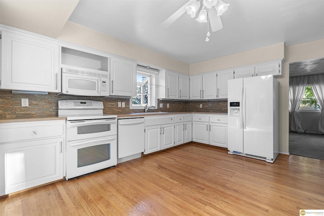 14618 Holmes St, Omaha, NE 68137 - kitchen featuring white appliances, white cabinetry, and light wood-type flooring