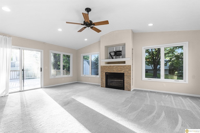 14618 Holmes St, Omaha, NE 68137 - unfurnished living room with carpet, baseboards, a glass covered fireplace, lofted ceiling, and a ceiling fan