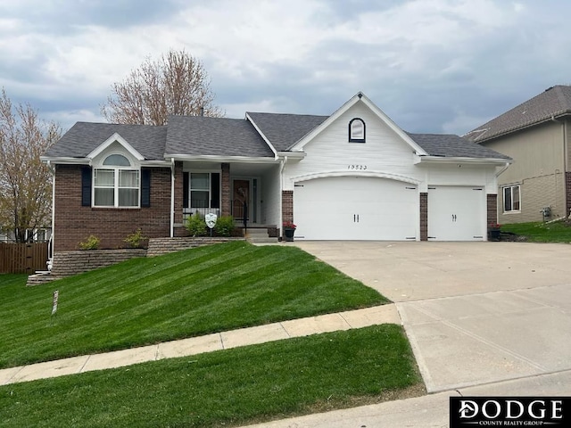 19523 Binney Cir, Elkhorn, NE 68022 - ranch-style home featuring driveway, brick siding, a garage, and a front yard