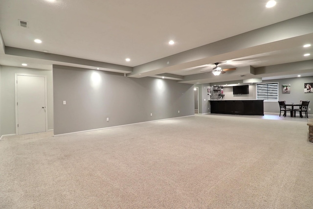 19523 Binney Cir, Elkhorn, NE 68022 - finished below grade area with recessed lighting, light colored carpet, bar area, baseboards, and ceiling fan