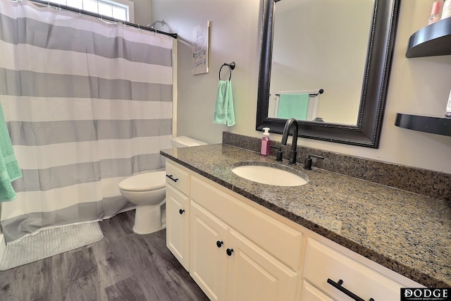 19523 Binney Cir, Elkhorn, NE 68022 - full bath with toilet, vanity, wood finished floors, and curtained shower