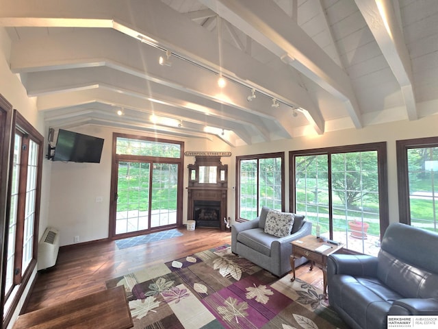 1924 W 8th Ave, Plattsmouth, NE 68048 - living room with wood finished floors, a fireplace, rail lighting, and baseboards