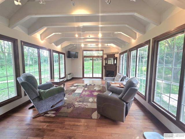 1924 W 8th Ave, Plattsmouth, NE 68048 - sunroom / solarium with plenty of natural light, wood-type flooring, and a wall mounted AC