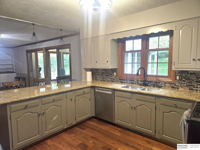 1924 W 8th Ave, Plattsmouth, NE 68048 - kitchen with stainless steel dishwasher, a sink, dark wood-style floors, a textured ceiling, and decorative backsplash