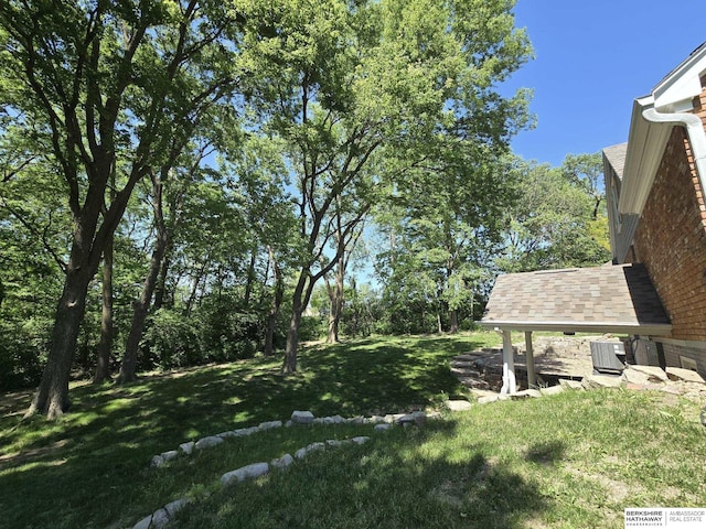 1924 W 8th Ave, Plattsmouth, NE 68048 - view of grassy yard featuring central AC unit