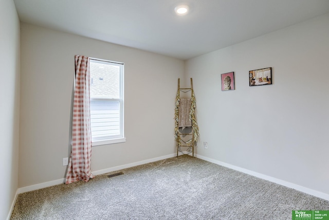 4411 Schilling Dr, Bellevue, NE 68123 - carpeted spare room featuring baseboards