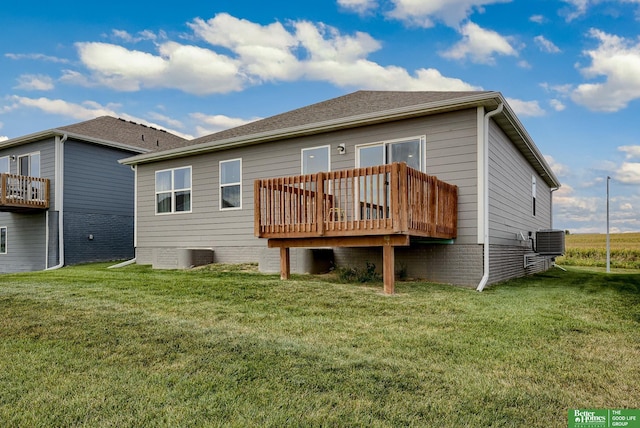 4411 Schilling Dr, Bellevue, NE 68123 - back of house featuring cooling unit, a deck, and a lawn