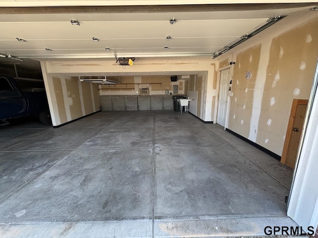 2110 Herel St, Lincoln, NE 68512 - garage with a garage door opener