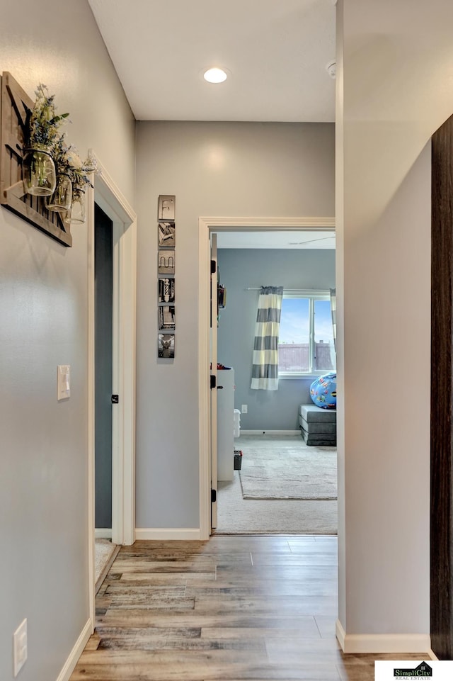 1946 Eastgate Dr, Crete, NE 68333 - hall featuring wood finished floors, baseboards, and recessed lighting