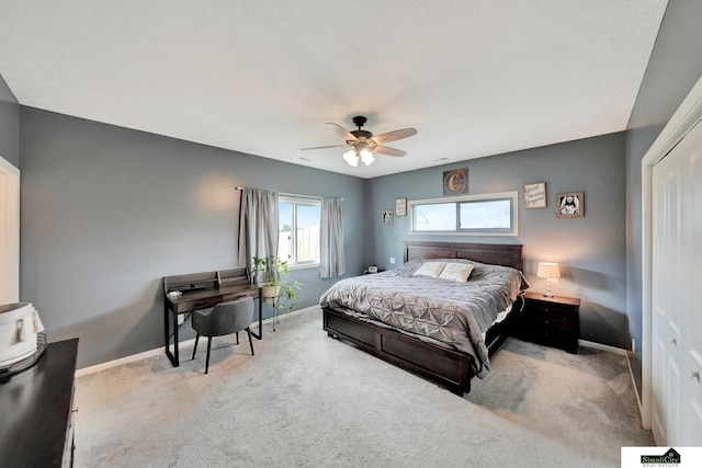 1946 Eastgate Dr, Crete, NE 68333 - bedroom with baseboards, carpet, and a ceiling fan