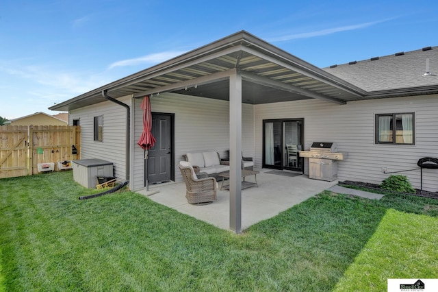 1946 Eastgate Dr, Crete, NE 68333 - back of property with a patio area and a shingled roof