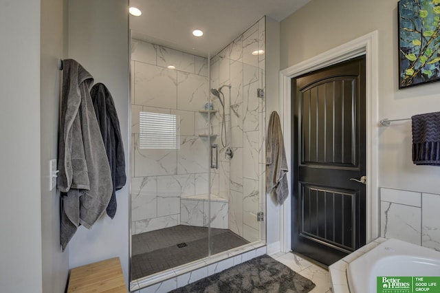 full bathroom with marble finish floors, a marble finish shower, recessed lighting, and a bath