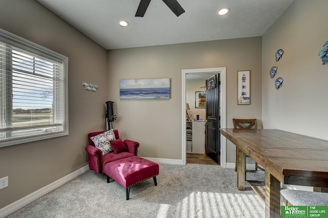 living area with carpet floors, a ceiling fan, baseboards, and recessed lighting