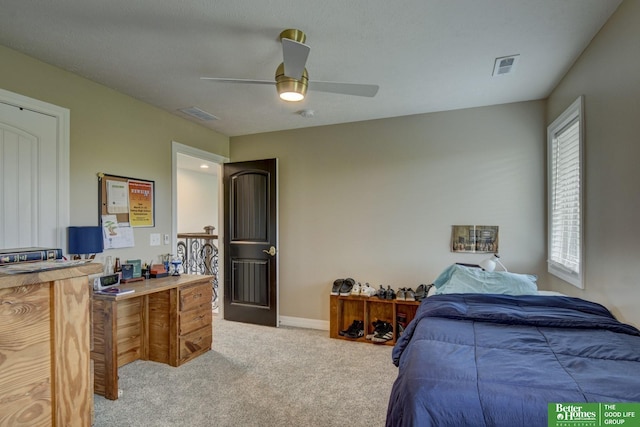 bedroom featuring carpet flooring, baseboards, and a ceiling fan