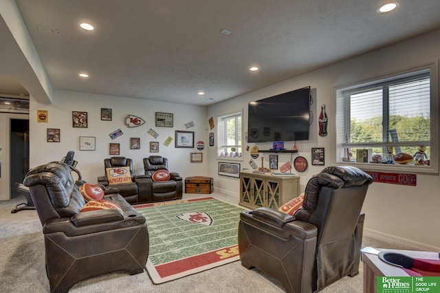 living room with recessed lighting, carpet floors, and baseboards
