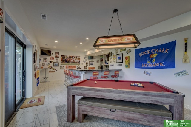 playroom featuring a bar, pool table, and recessed lighting