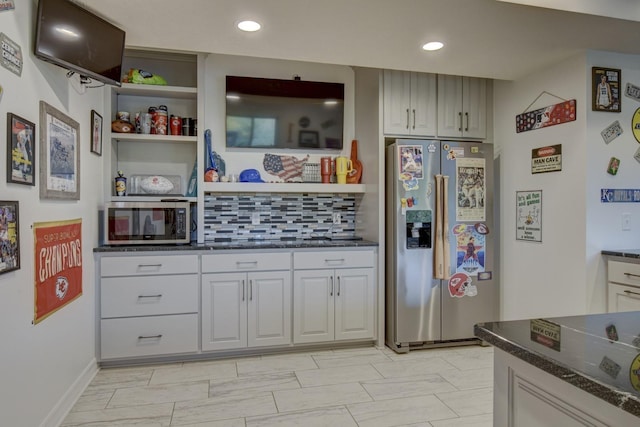 kitchen featuring stainless steel appliances, open shelves, decorative backsplash, recessed lighting, and dark stone countertops