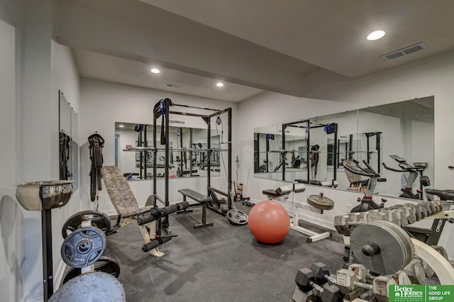 workout area with recessed lighting