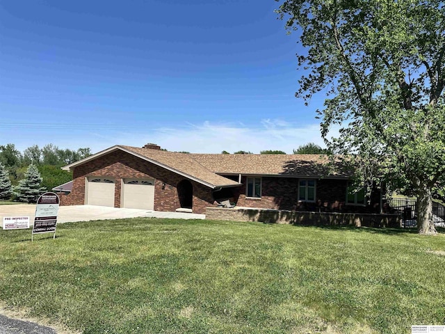 17819 Nicholas Rd, Plattsmouth, NE 68048 - single story home with brick siding, an attached garage, and a front yard