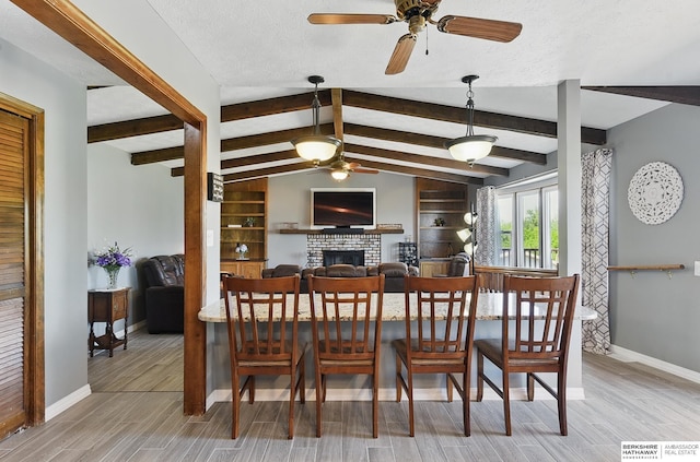 17819 Nicholas Rd, Plattsmouth, NE 68048 - dining room featuring ceiling fan, baseboards, and wood finished floors