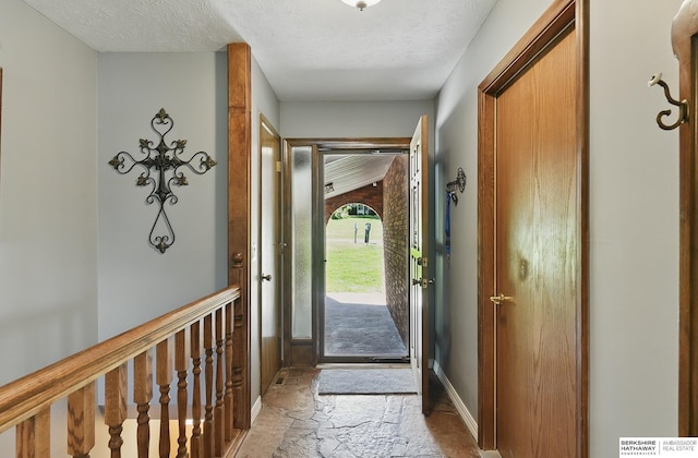 17819 Nicholas Rd, Plattsmouth, NE 68048 - foyer entrance featuring stone finish floors