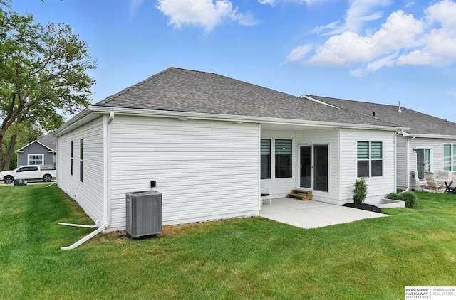 10280 S 209th St, Gretna, NE 68028 - back of house with a yard, a patio area, central AC, and roof with shingles