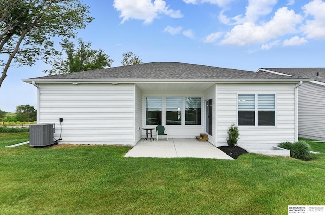 10280 S 209th St, Gretna, NE 68028 - rear view of property featuring central AC unit, a patio, and a lawn
