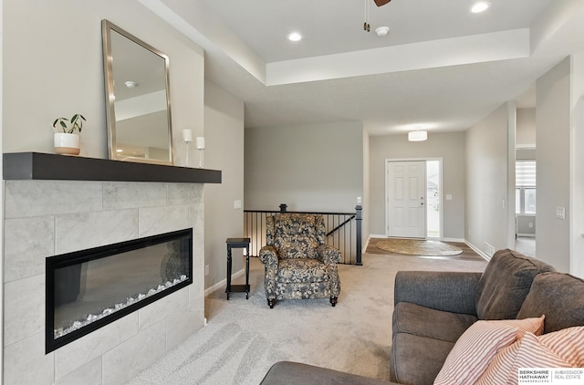 10280 S 209th St, Gretna, NE 68028 - living area with carpet flooring, a fireplace, recessed lighting, baseboards, and a raised ceiling