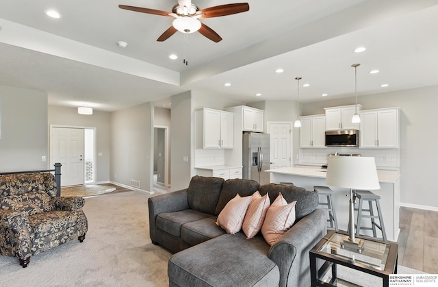 10280 S 209th St, Gretna, NE 68028 - living area with recessed lighting, ceiling fan, baseboards, and light colored carpet