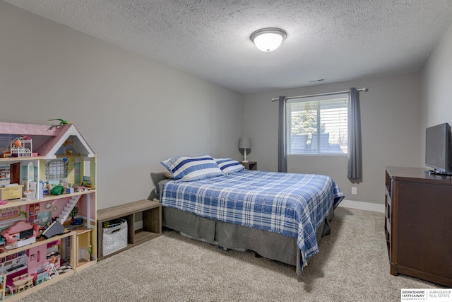 2310 Acorn Dr, Plattsmouth, NE 68048 - bedroom with carpet, a textured ceiling, and baseboards