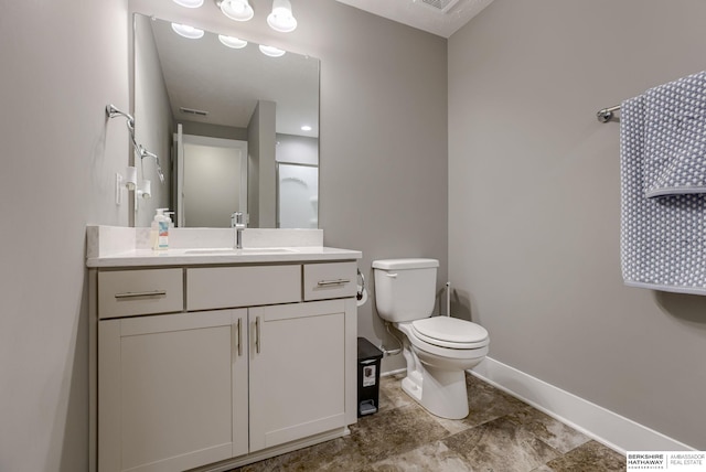 2310 Acorn Dr, Plattsmouth, NE 68048 - full bathroom with baseboards, toilet, and vanity