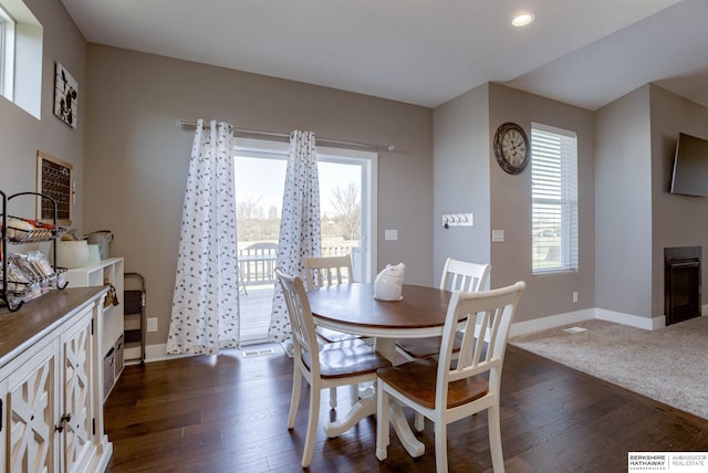 2310 Acorn Dr, Plattsmouth, NE 68048 - dining space featuring plenty of natural light, dark wood-type flooring, baseboards, and recessed lighting