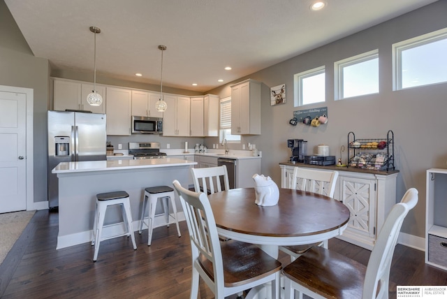 2310 Acorn Dr, Plattsmouth, NE 68048 - dining space featuring dark wood finished floors, recessed lighting, and baseboards
