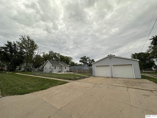 2002 Warren St, Bellevue, NE 68005 - view of front facade featuring an outdoor structure and a garage