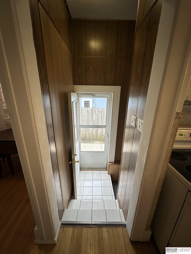 2002 Warren St, Bellevue, NE 68005 - corridor with wood walls and wood finished floors