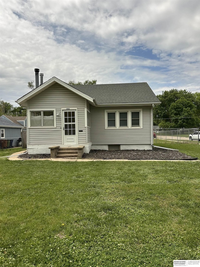 2002 Warren St, Bellevue, NE 68005 - rear view of house with a shingled roof
