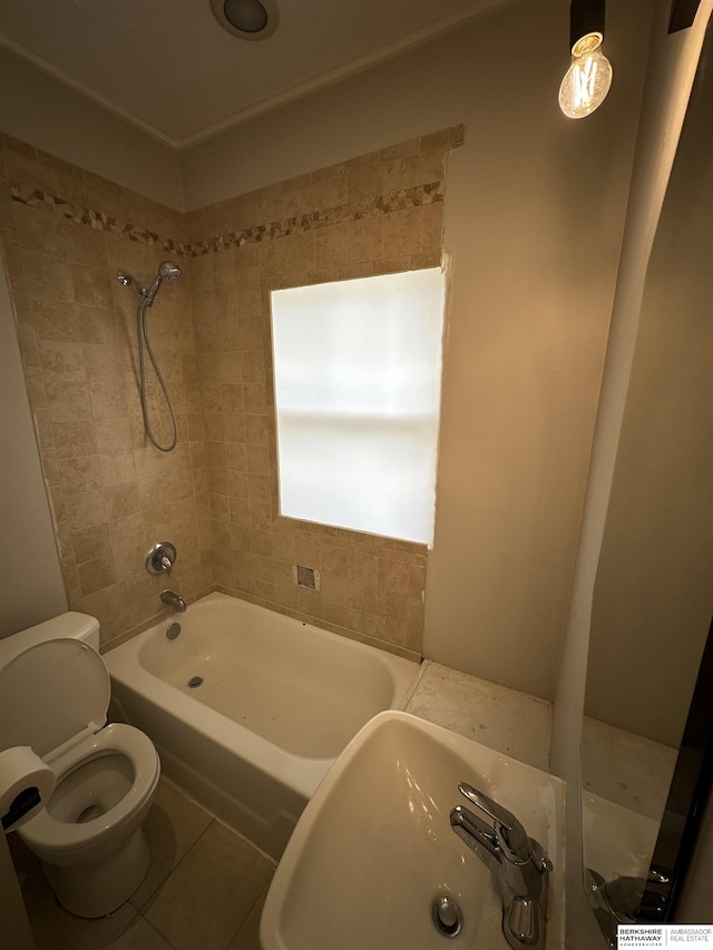 2002 Warren St, Bellevue, NE 68005 - full bathroom featuring toilet, shower / bathtub combination, a sink, and tile patterned flooring