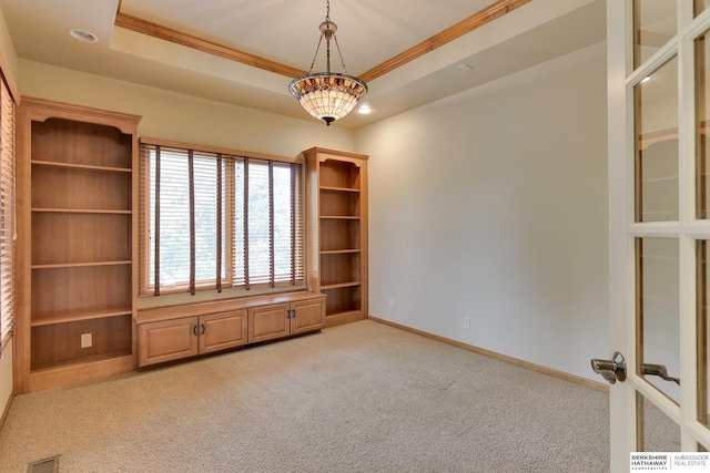 1414 S 189th Ct, Omaha, NE 68130 - spare room with light carpet, crown molding, baseboards, and a tray ceiling