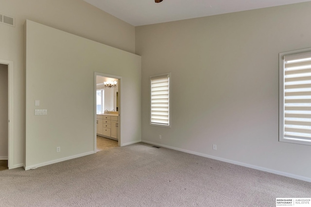 1414 S 189th Ct, Omaha, NE 68130 - spare room with light carpet and baseboards