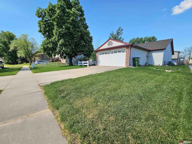 10531 N 137th St, Waverly, NE 68462 - view of home's exterior with driveway, cooling unit, a garage, and brick siding