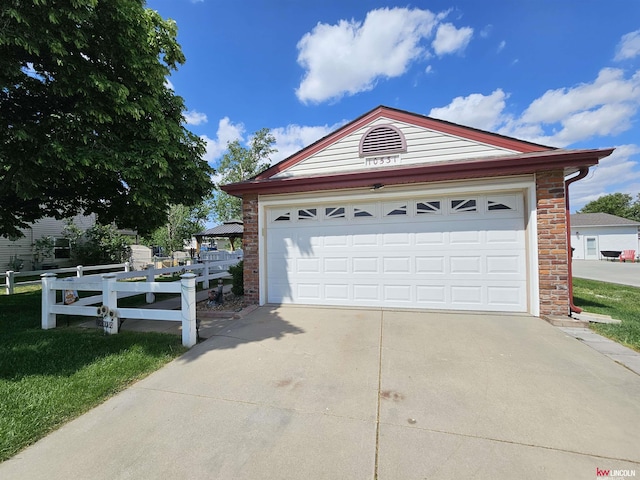 10531 N 137th St, Waverly, NE 68462 - garage with driveway and fence