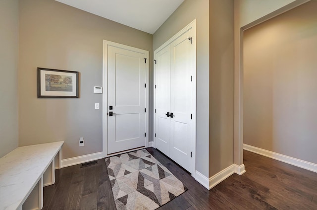 8947 Himark Ln, Lincoln, NE 68526 - foyer with baseboards and dark wood-style flooring